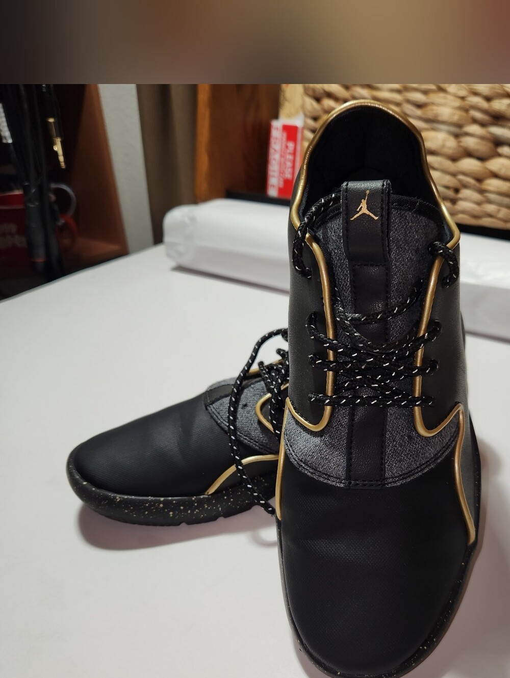 Women Jordan Black Sneakers with Gold Trim